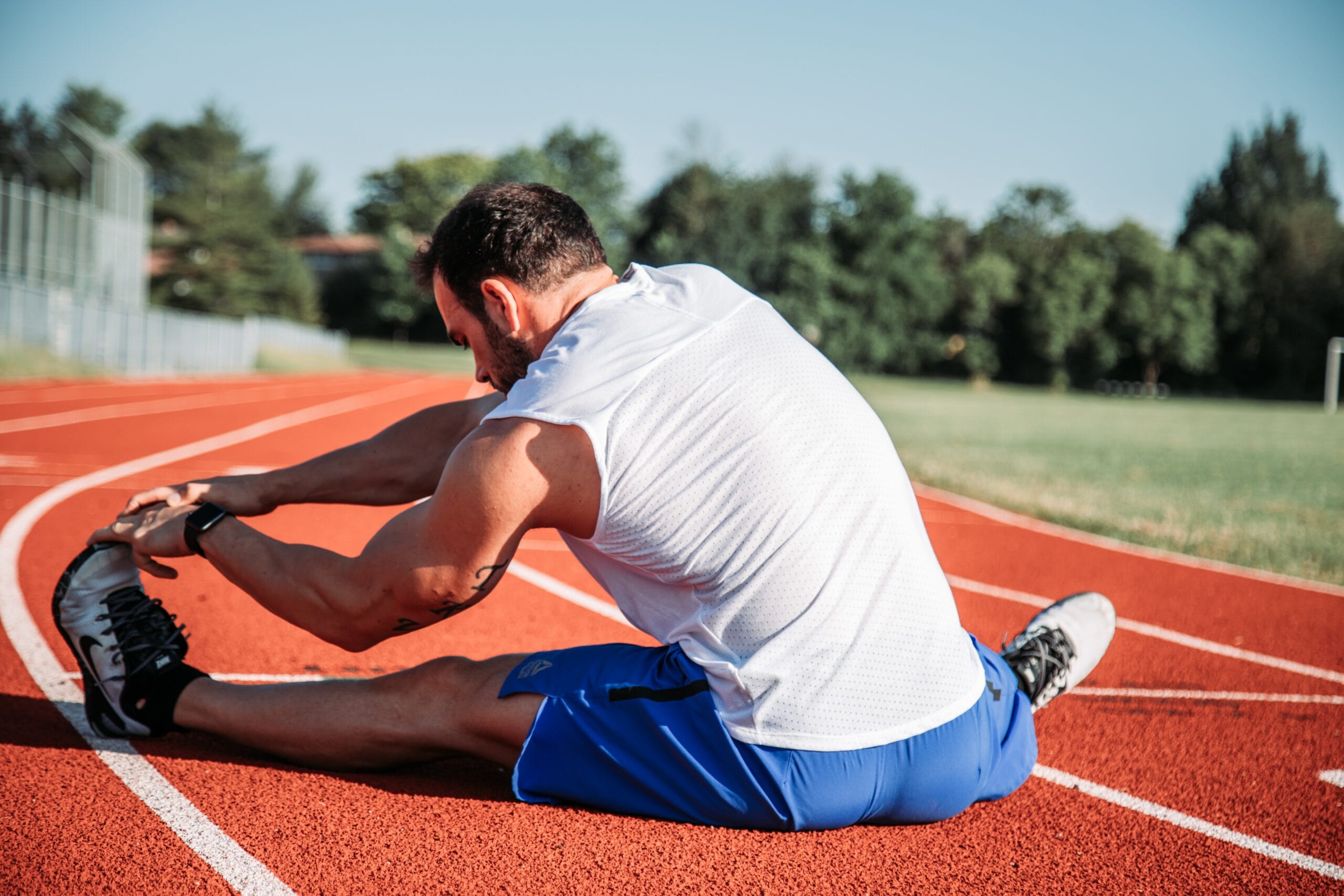 Leg-stretching exercises as part of sports training sessions in Adelaide for injury prevention